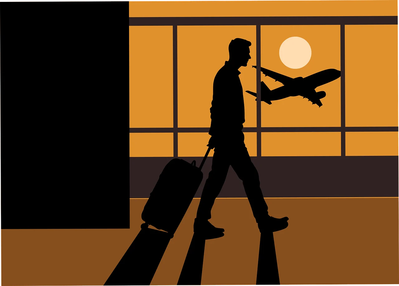 Passaporte e passagens aéreas dispostos sobre um mapa mundi, simbolizando o planejamento de uma viagem internacional.